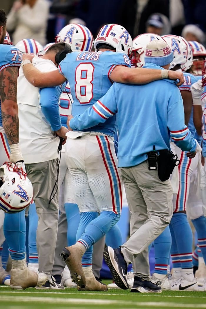 Tennessee Titans quarterback Will Levis (8) is helped off of the field in overtime against the Houston Texans at Nissan Stadium in Nashville, Tenn., Sunday, Dec. 17, 2023.